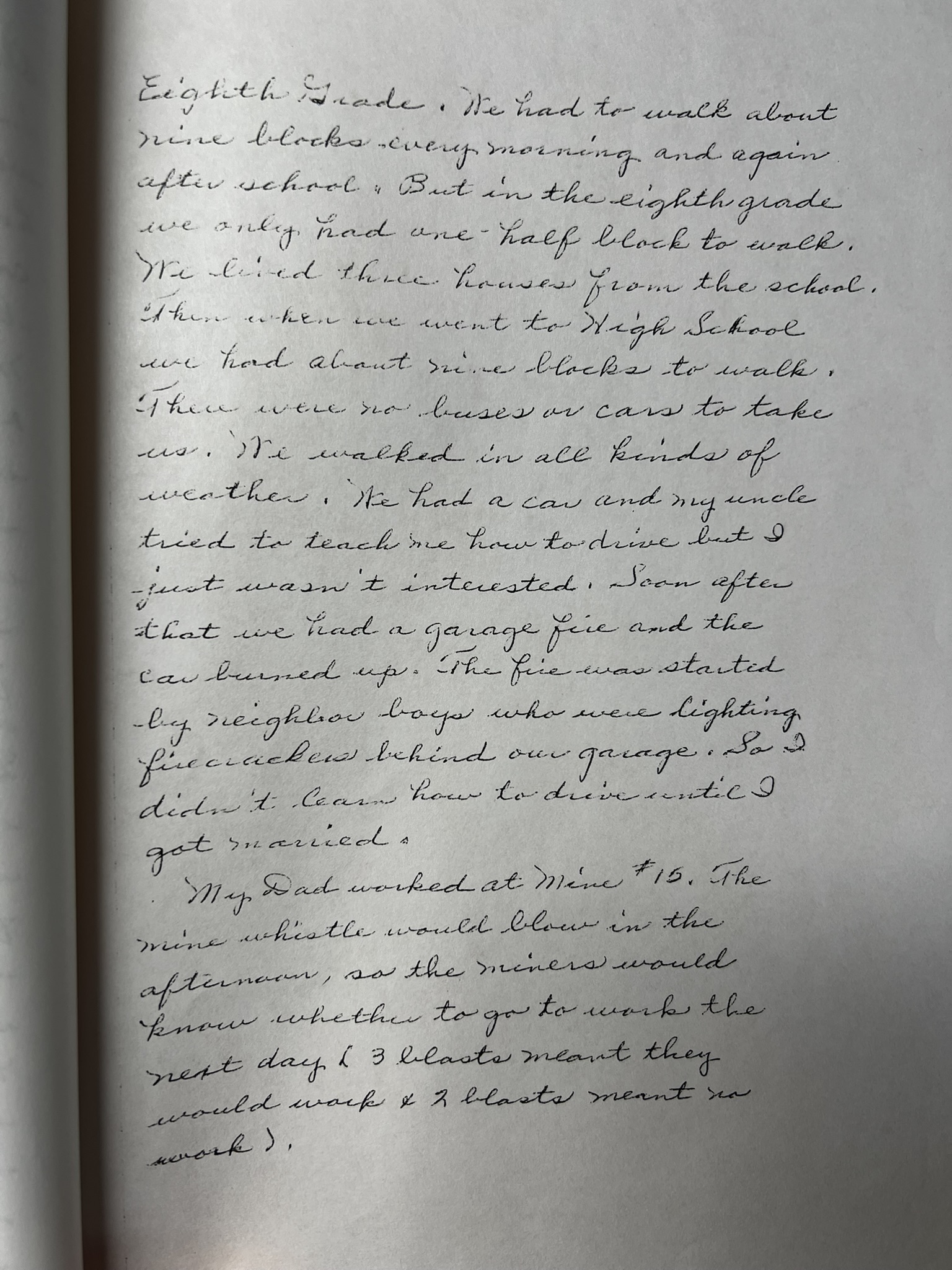 Handwritten page 7 — school years, walking nine blocks, and the mine whistle